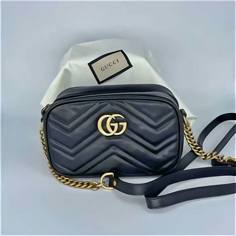 Gucci Tracolla con maxi occhielli